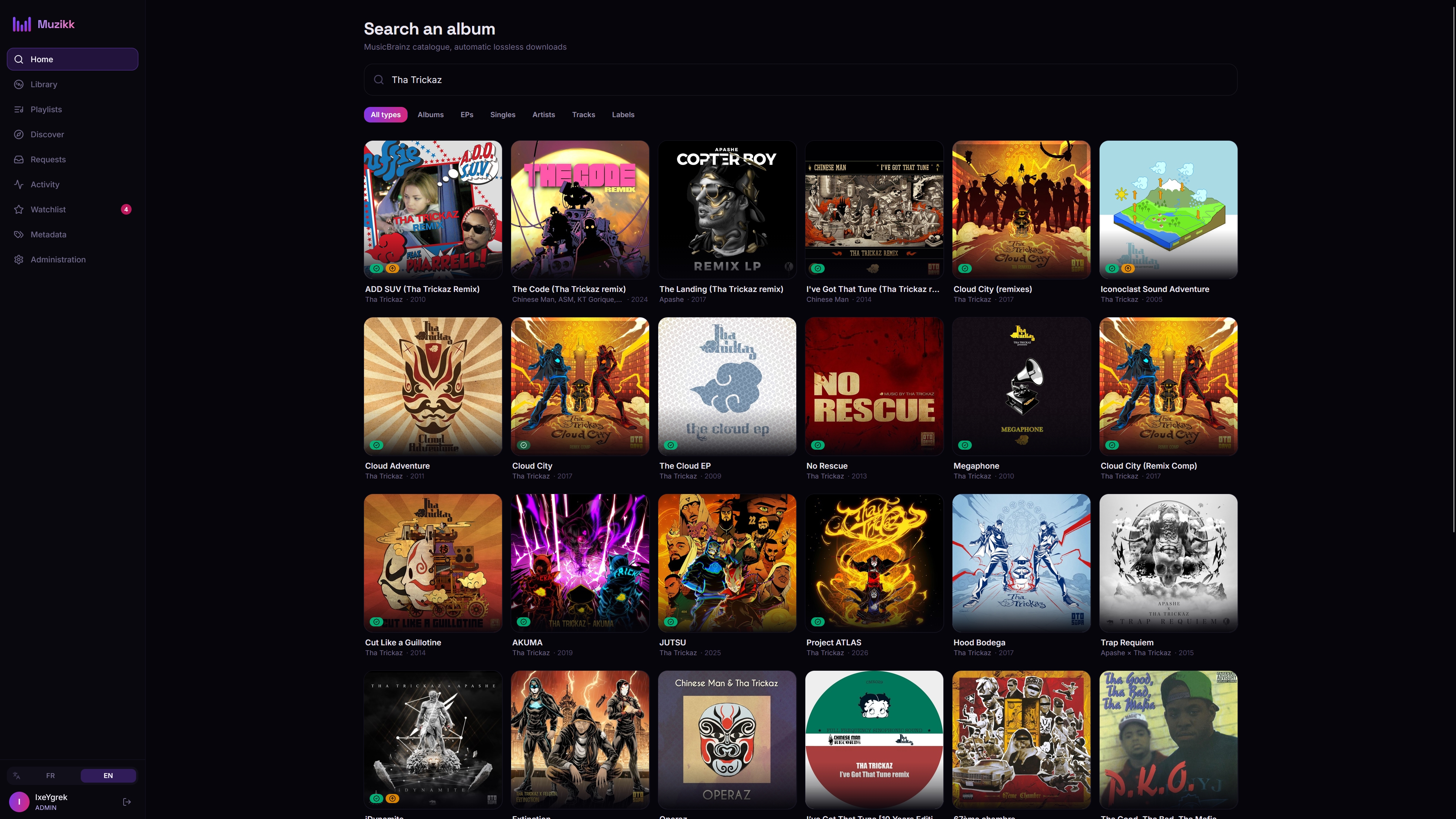 Search results, with an ownership badge and a play button on every release.
